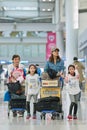 Family with baggage trolleys at Icheon Airport, Seoul, South Korea Royalty Free Stock Photo